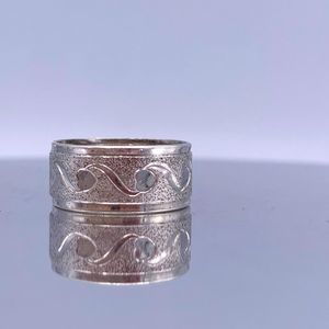 Vintage Sterling Silver Ring with Heart Engraving and Grain Detailing